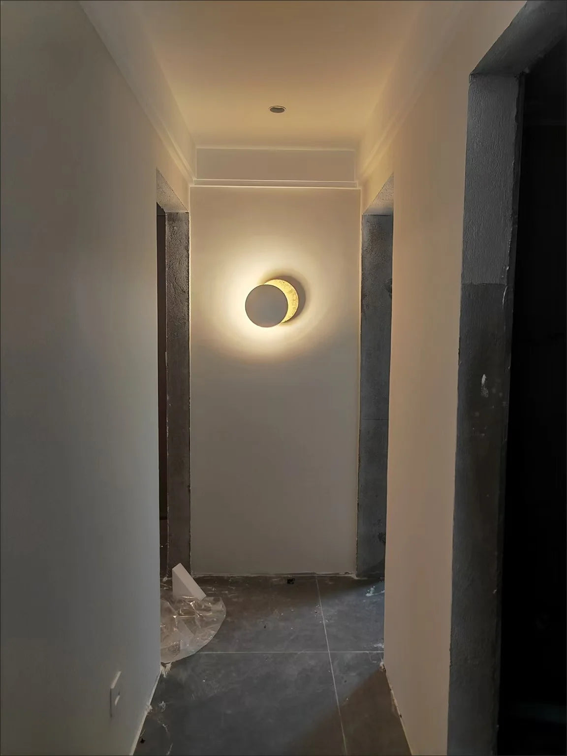 Wall Sconce - Modern Scandinavian Art in the shape of an eclipse