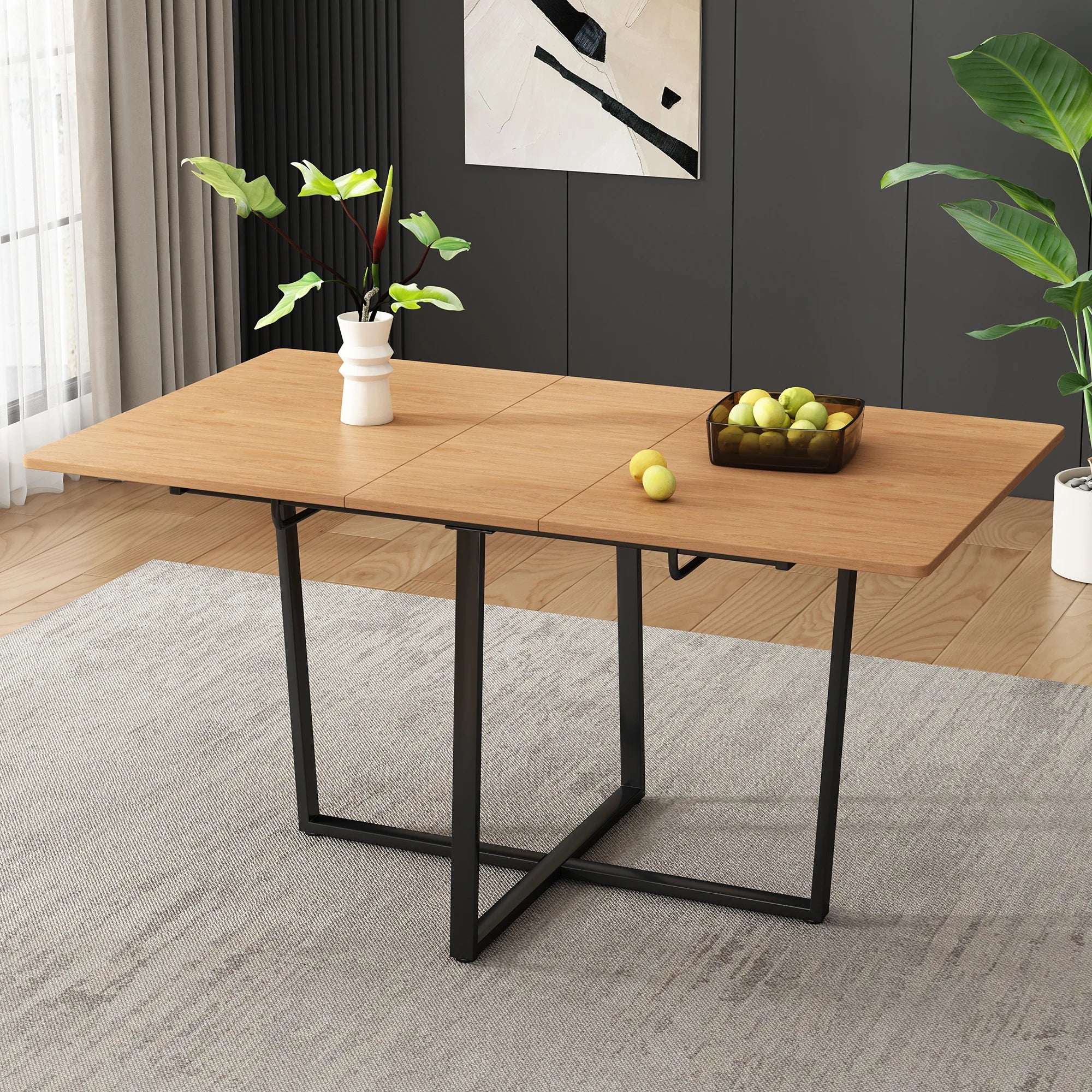 Modern extendable dining table with black metal legs for 4 to 6 people