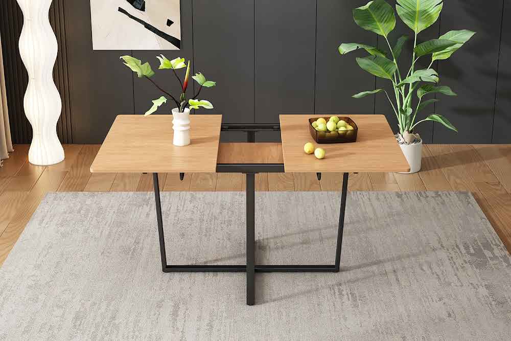Modern extendable dining table with black metal legs for 4 to 6 people