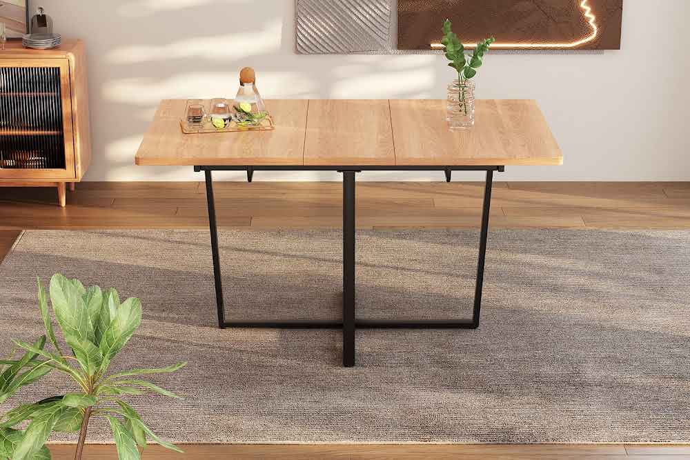 Modern extendable dining table with black metal legs for 4 to 6 people
